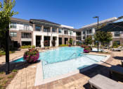 Thumbnail 9 of 19 - The Juncture Apartments second resort-style pool with surrounding sundeck