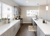 Thumbnail 9 of 12 - Lansdale Station Apartments wood grain cabinetry