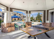 Thumbnail 9 of 31 - Poolside cabana with ping pong table - Lantern Woods Apartments