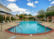 Thumbnail 10 of 21 - The Vineyards resort-style pool and surrounding sundeck