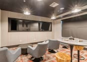 Thumbnail 11 of 21 - Arazo clubhouse interior with lounge chairs and high tables
