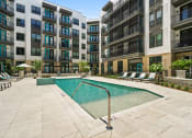 Thumbnail 11 of 24 - Axio at Carillon pool with surrounding sundeck