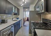 Thumbnail 11 of 12 - Hill House on Chestnut Hill - Modern kitchen appliances and cabinetry