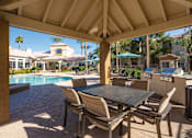 Thumbnail 11 of 23 - Poolside BBQ and picnic area - Sonterra Apartments at Paradise Valley