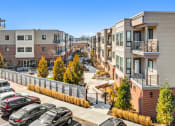 Thumbnail 12 of 12 - Lansdale Station Apartments exterior photo of landscaping and balconies