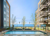 Thumbnail 12 of 22 - Resort-style swimming pool - BLVD at Revere Beach