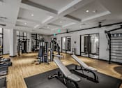 Thumbnail 12 of 36 - Two-story fitness center - The Remy Apartments