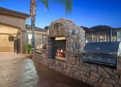 Thumbnail 13 of 37 - Antelope Ridge Apartments poolside fireplace