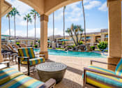 Thumbnail 13 of 30 - Poolside cabana with ample seating - Arrowhead Landing Apartments