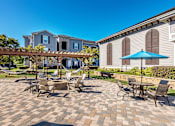 Thumbnail 12 of 25 - Outdoor lounge with fire pit - The Crossings at Alexander Place
