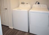 Thumbnail 12 of 18 - Hamptons on Heron Bay laundry room