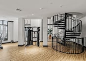 Thumbnail 13 of 36 - Two-story fitness center - The Remy Apartments