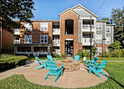 Thumbnail 14 of 28 - Fire pit lounge - Belle Harbour Apartments