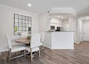 Thumbnail 14 of 24 - Open-concept floor plans with dining nook - Grand Centennial Apartments