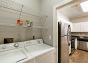 Thumbnail 15 of 24 - Island Park and Harbor Town Square Apartments - Full-sized washer/dryer