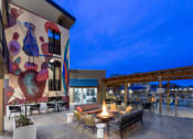 Thumbnail 15 of 23 - Poolside fire pit area - ABQ Uptown Apartments