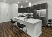 Thumbnail 16 of 25 - Modern kitchens with stainless steel appliances - Debbie Lane Flats