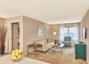 Thumbnail 15 of 16 - Carpeted living space in select units - Hampshire Green Apartments
