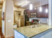 Thumbnail 15 of 19 - The Oaks at Johns Creek - 42-inch cherry cabinetry
