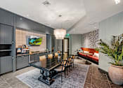Thumbnail 15 of 36 - Resident clubhouse with coffee bar - The Remy Apartments