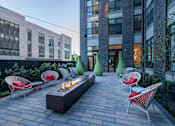 Thumbnail 15 of 24 - Outdoor fire pit lounge - Rockwell at Crown