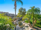 Thumbnail 16 of 37 - Antelope Ridge Apartments exterior view with palm trees