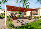 Thumbnail 16 of 30 - BBQ lounge area - Arrowhead Landing Apartments