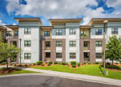 Thumbnail 16 of 26 - Centre Pointe Apartments balconies and landscaping