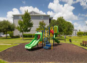 Thumbnail 16 of 24 - Courtney Station Apartments - Tot lot play area