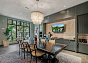 Thumbnail 16 of 36 - Resident clubroom with wine parlor - The Remy Apartments