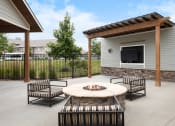 Thumbnail 16 of 30 - The Haven at Shoal Creek - TV lounge with fire pit