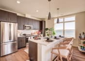 Thumbnail 17 of 22 - Large kitchen island in select units - BLVD at Revere Beach