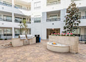Thumbnail 17 of 32 - Courtyard with BBQ station and fire pit - Everlee
