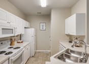 Thumbnail 17 of 31 - White appliances in select units - Lantern Woods Apartments
