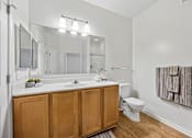 Thumbnail 19 of 29 - Well-lit bathroom vanities - Avenel at Montgomery Square