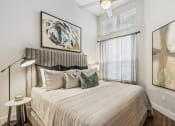 Thumbnail 19 of 24 - Axio at Carillon bedroom with ceiling fan