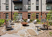 Thumbnail 19 of 27 - Outdoor lounge with fire pit - Brentford at the Mile
