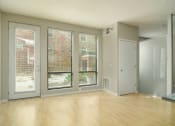 Thumbnail 19 of 27 - Wood-style flooring and large windows - Eitel Apartments