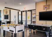 Thumbnail 18 of 46 - Element 25 foosball table and air hockey with flat screen TVs
