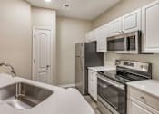 Thumbnail 18 of 31 - Stainless steel appliances in select units - Lantern Woods Apartments
