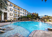 Thumbnail 18 of 37 - Resort-style pool with sun deck - Monterra Las Colinas Apartments