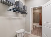 Thumbnail 20 of 21 - Arazo walk-in closet with white wire shelving