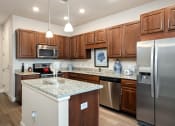 Thumbnail 20 of 30 - The Haven at Shoal Creek - Spacious kitchens with granite countertops