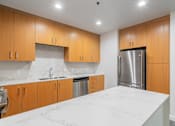 Thumbnail 21 of 42 - White marble countertops in select units - Main 3 Downtown