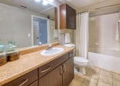Thumbnail 22 of 24 - Courtney Station Apartments - Ceramic tile flooring in bathrooms