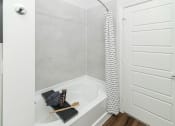 Thumbnail 24 of 25 - Oval tub and shower - Debbie Lane Flats