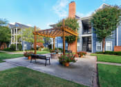 Thumbnail 24 of 24 - Island Park and Harbor Town Square Apartments -  Pergola with water fountain