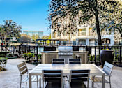 Thumbnail 22 of 37 - BBQ station with picnic area - Monterra Las Colinas Apartments