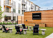 Thumbnail 23 of 42 - Fire pit lounge areas - Stonehill at West Orange