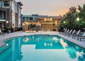 Thumbnail 26 of 26 - Centre Pointe Apartments resort-style pool area with surrounding sundeck